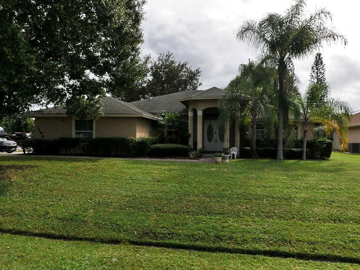 1198 SE Petunia Avenue, Port St. Lucie, FL 34952 — photo 1 of 35