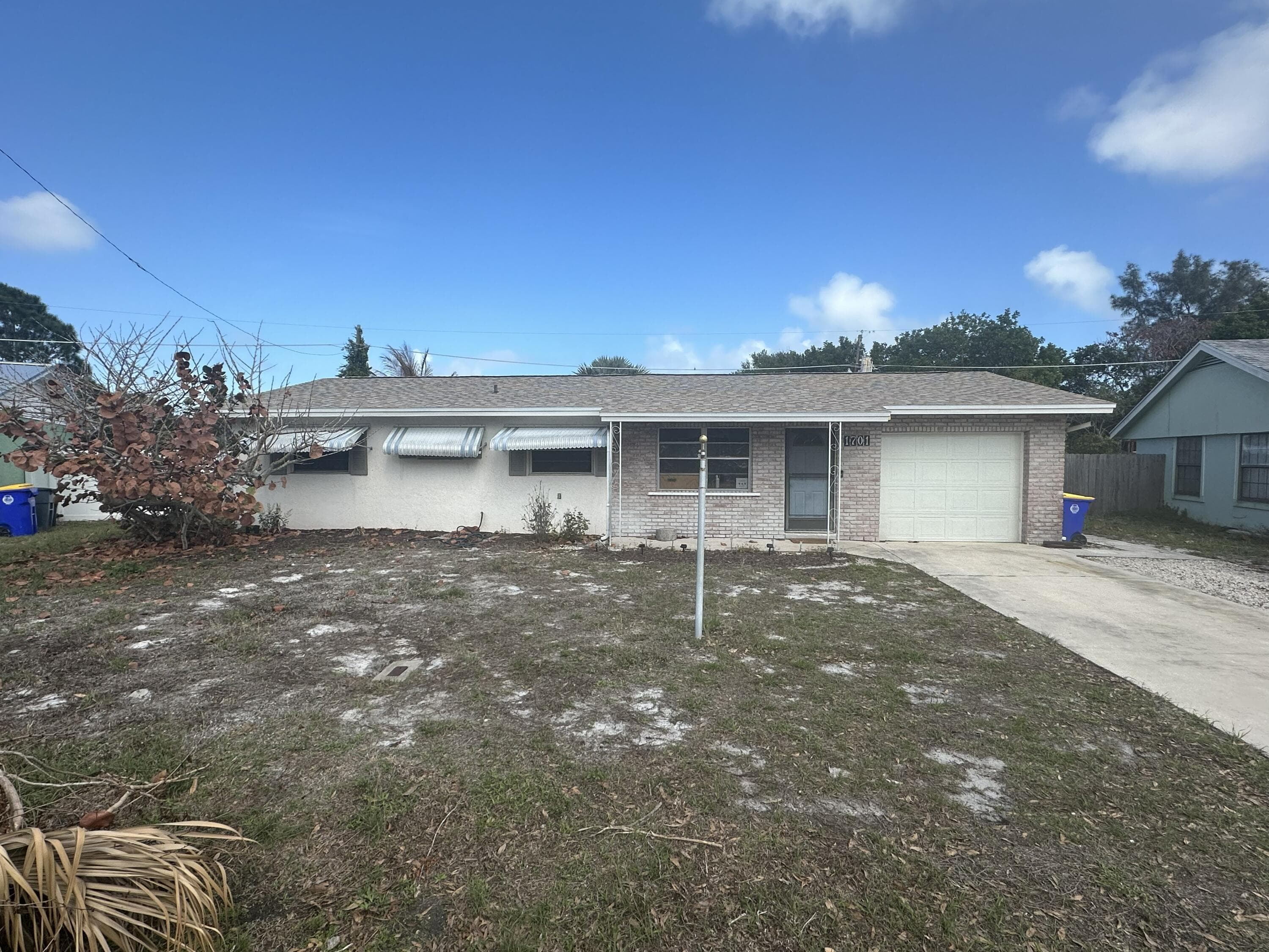 1701 NE 16th Drive, Jensen Beach, FL 34957 — photo 1 of 12