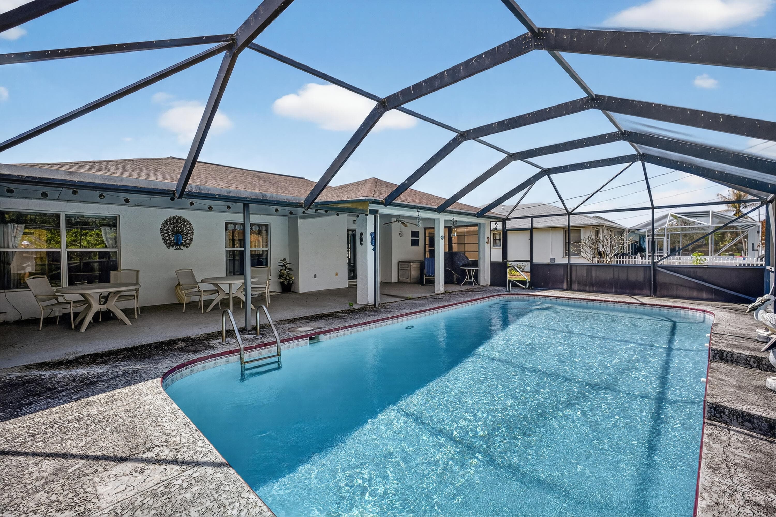 459 SE Nome Drive, Port St. Lucie, FL 34984 — photo 1 of 47