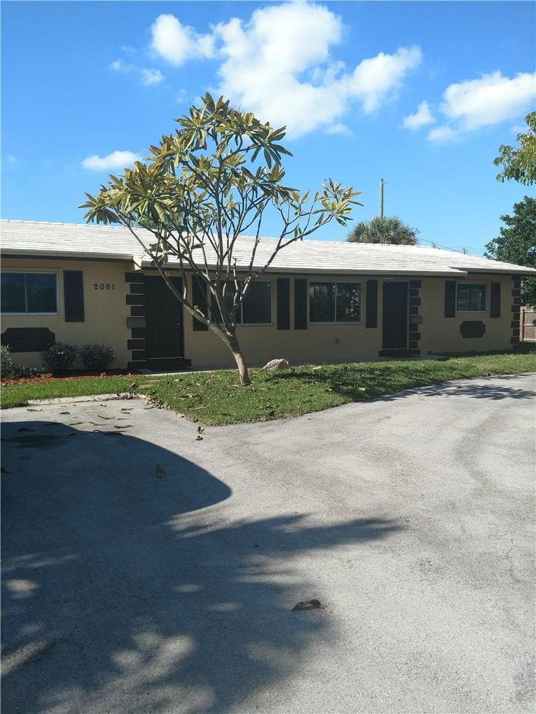 2061 NE 25th Avenue, Pompano Beach, FL 33062 — photo 1 of 12