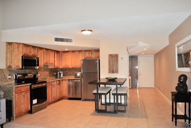 49 Deer Creek Road E105, Deerfield Beach, FL 33442 — photo 1 of 13