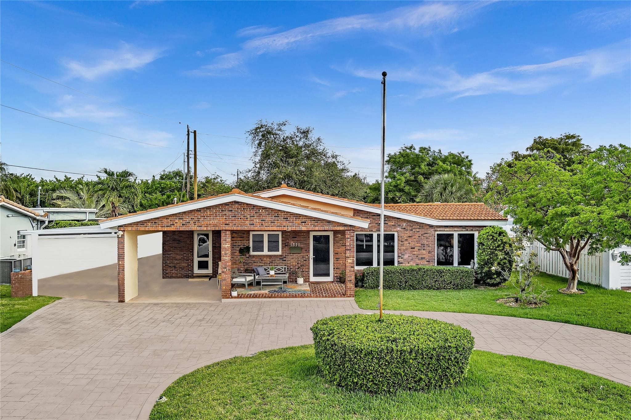 1311 NE 42nd Street, Oakland Park, FL 33334 — photo 1 of 57