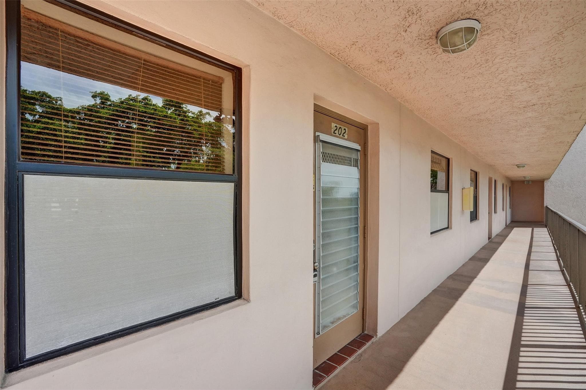 10434 Sunrise Lakes Boulevard 202, Sunrise, FL 33322 — photo 2 of 27