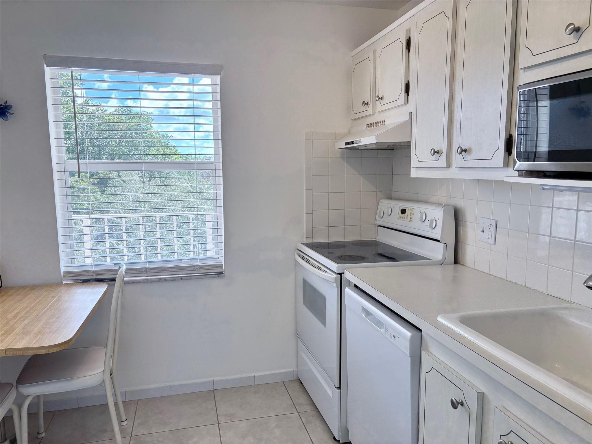 1055 Country Club Drive 404, Margate, FL 33063 — photo 4 of 70