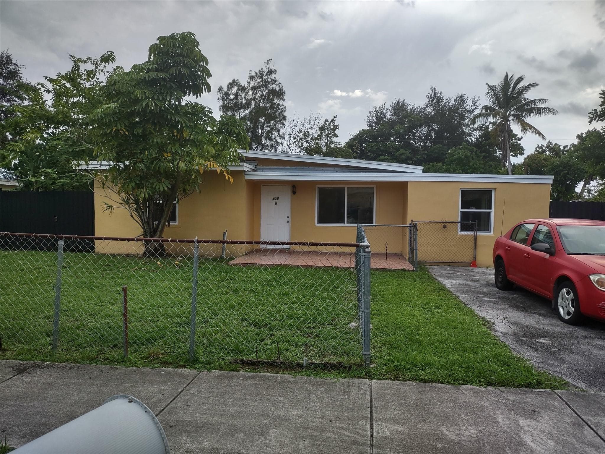 128 Miami Gardens Road, West Park, FL 33023 — photo 2 of 38