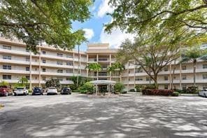3800 Oaks Clubhouse Drive 110, Pompano Beach, FL 33069 — photo 1 of 57