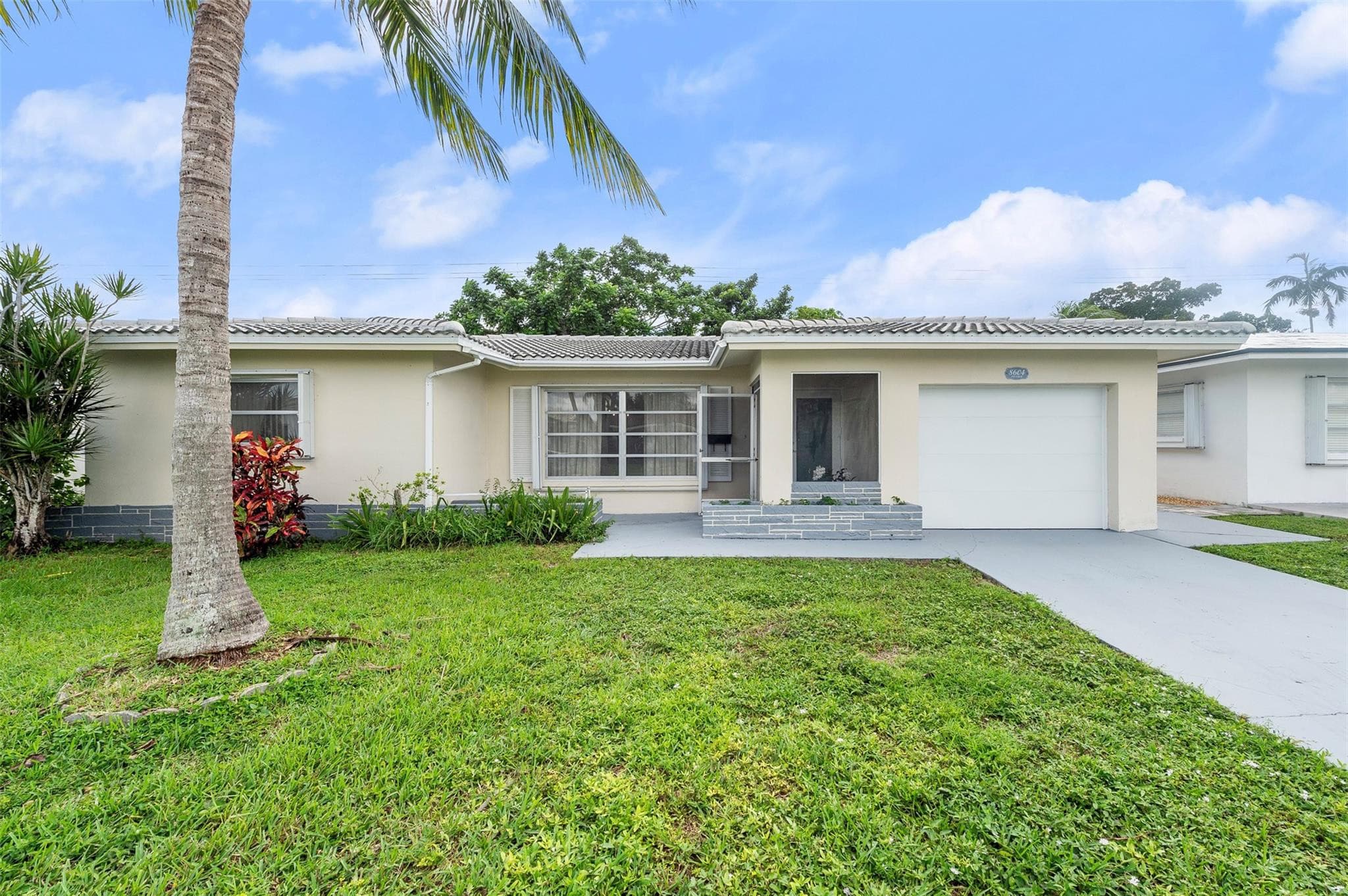 8604 NW 57th Court, Tamarac, FL 33321 — photo 1 of 23