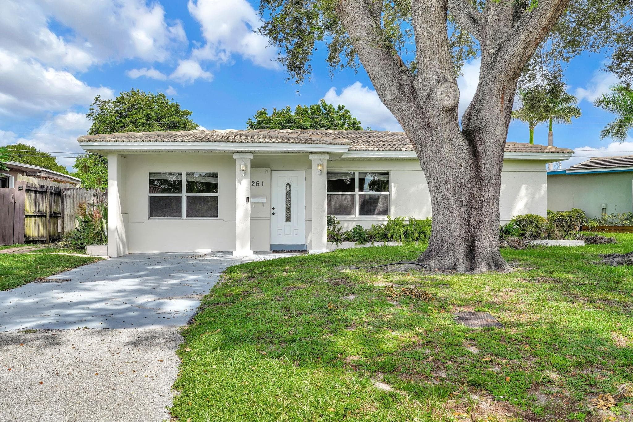 261 NE 45th Street, Oakland Park, FL 33334 — photo 1 of 55