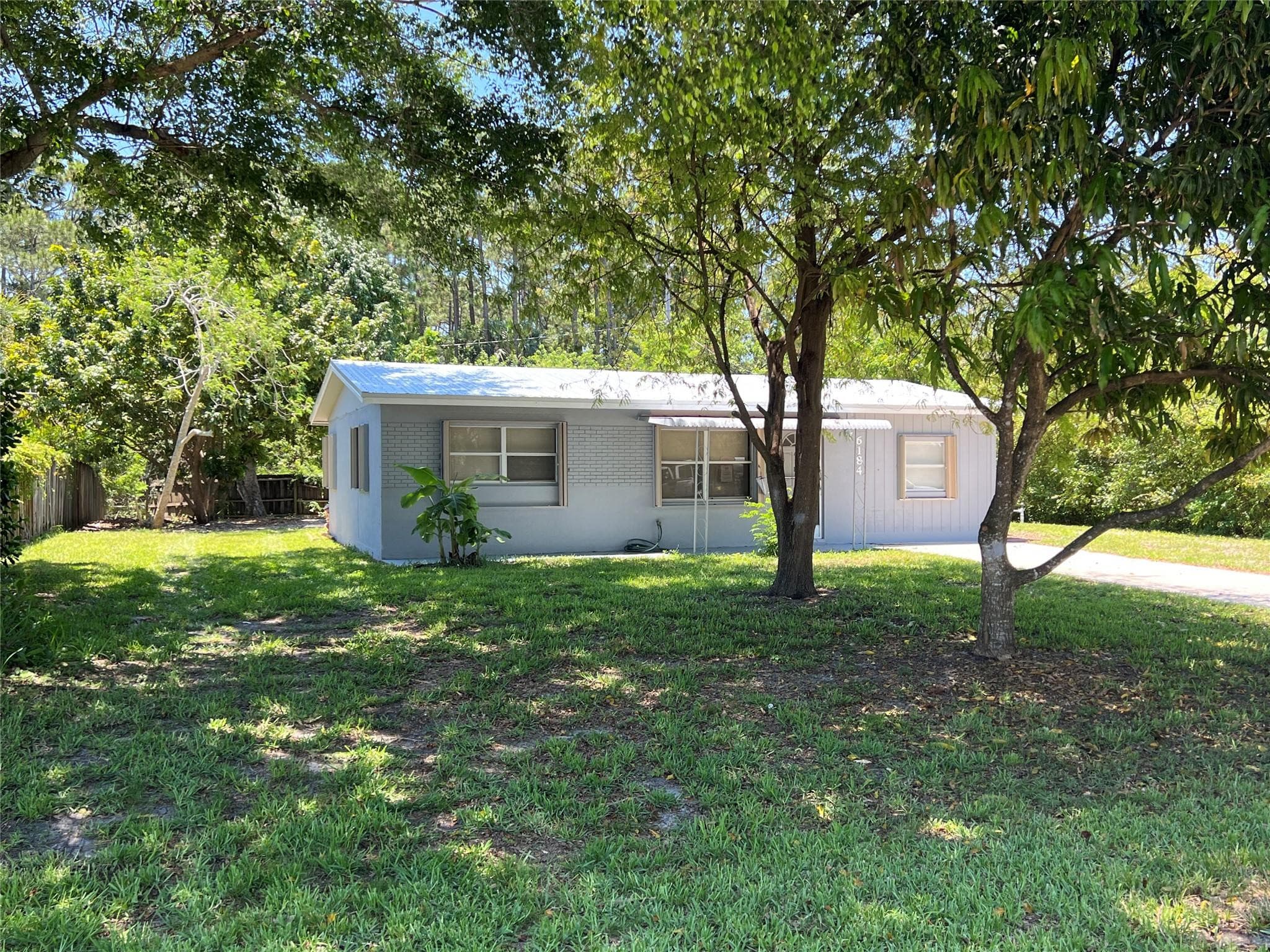 6184 SE Orange Blossom Trail, Hobe Sound, FL 33455 — photo 2 of 18