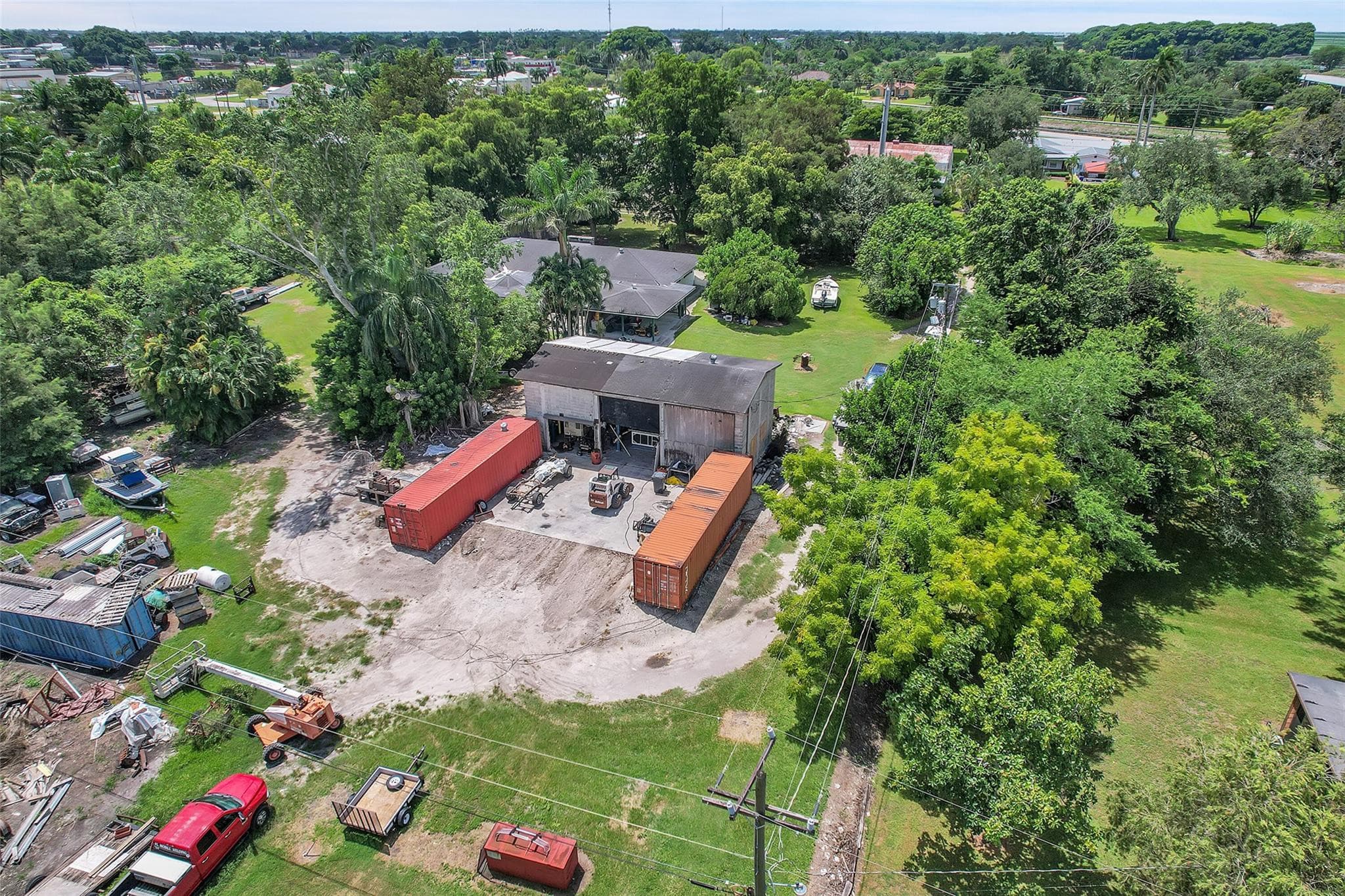 Single Family Residence in Belle Glade — photo 1 of 74