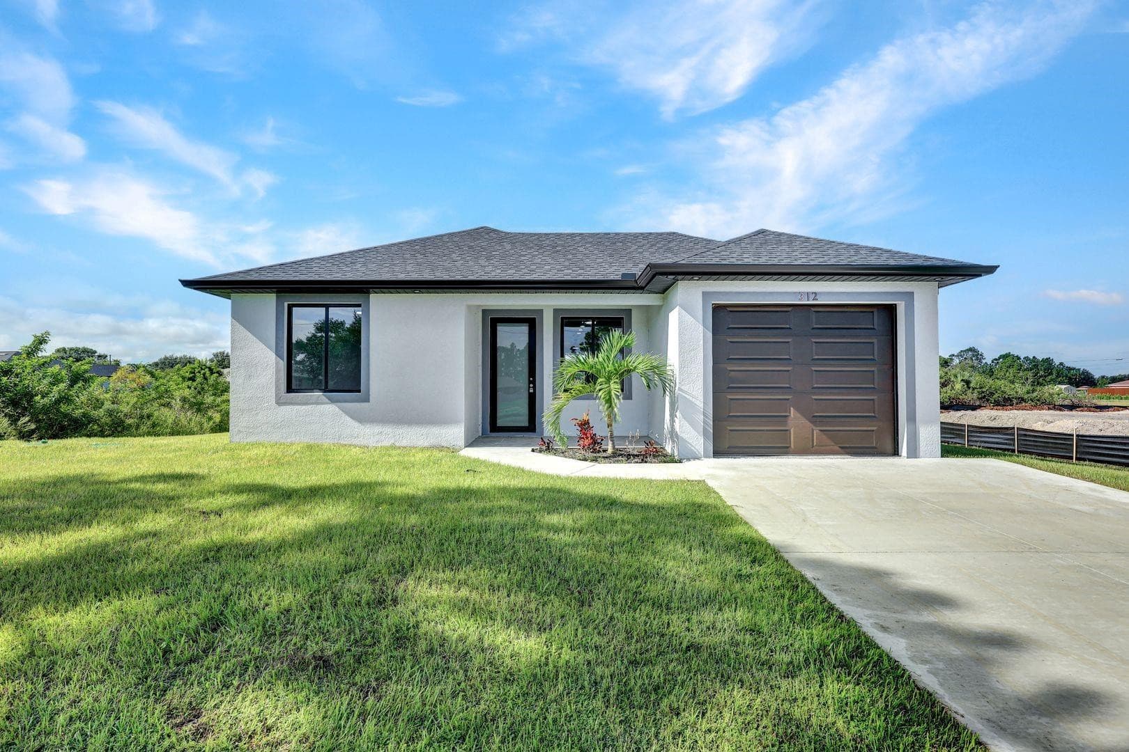 312 Progress Avenue, Lehigh Acres, FL 33974 — photo 1 of 18