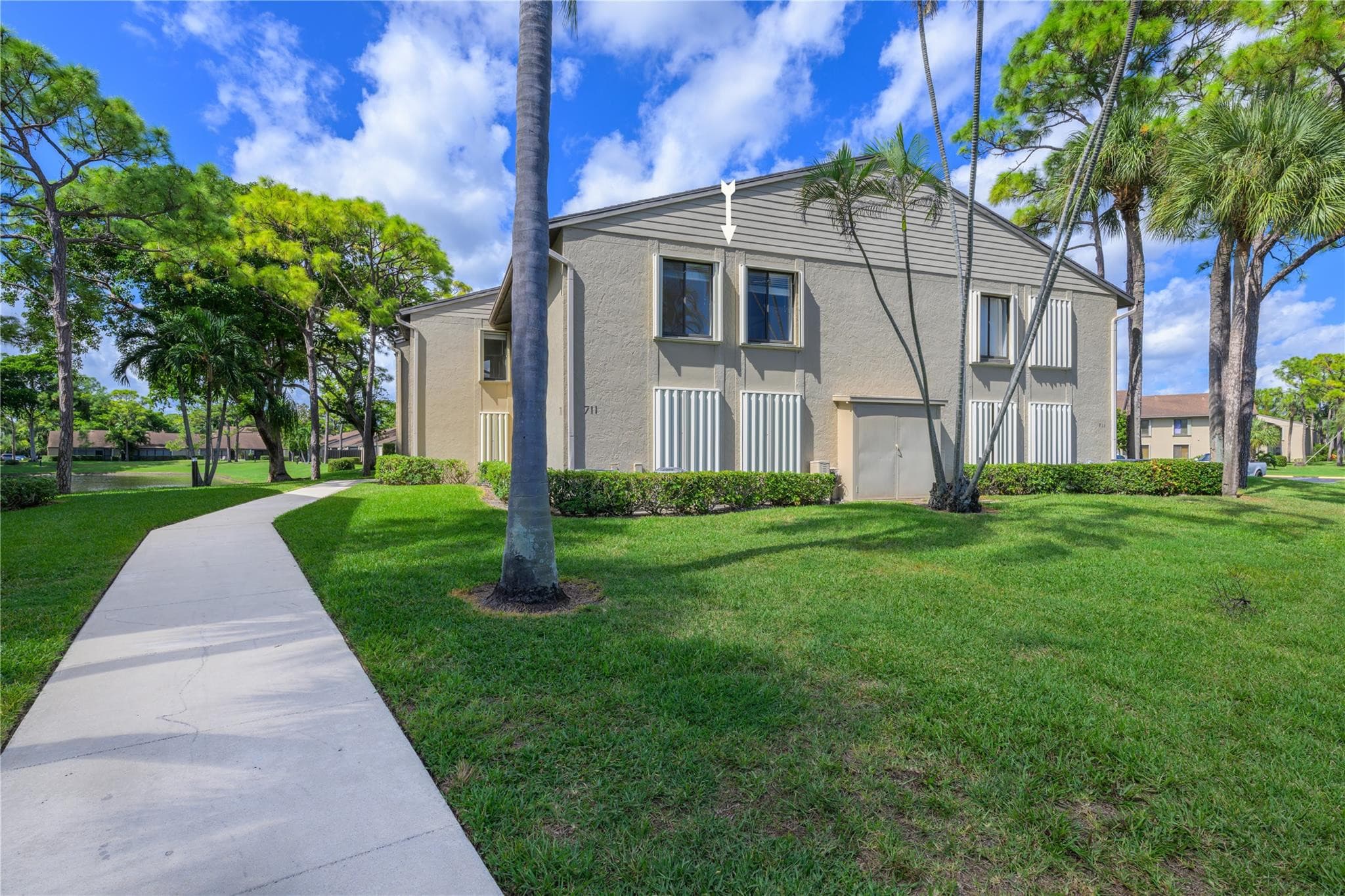 711 Sunny Pine Way B-2, Greenacres, FL 33415 — photo 1 of 32