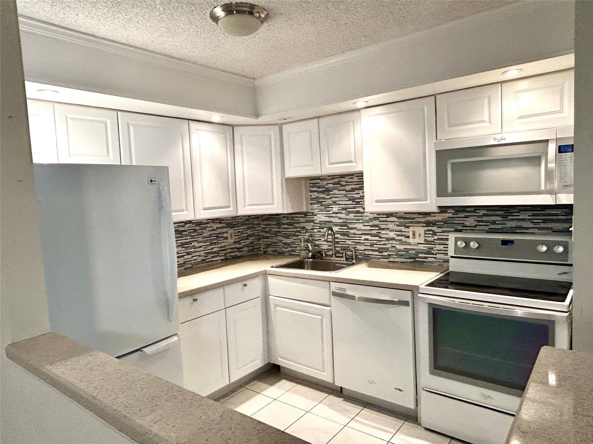 10429 E Clairmont Circle 108, Tamarac, FL 33321 — photo 1 of 12