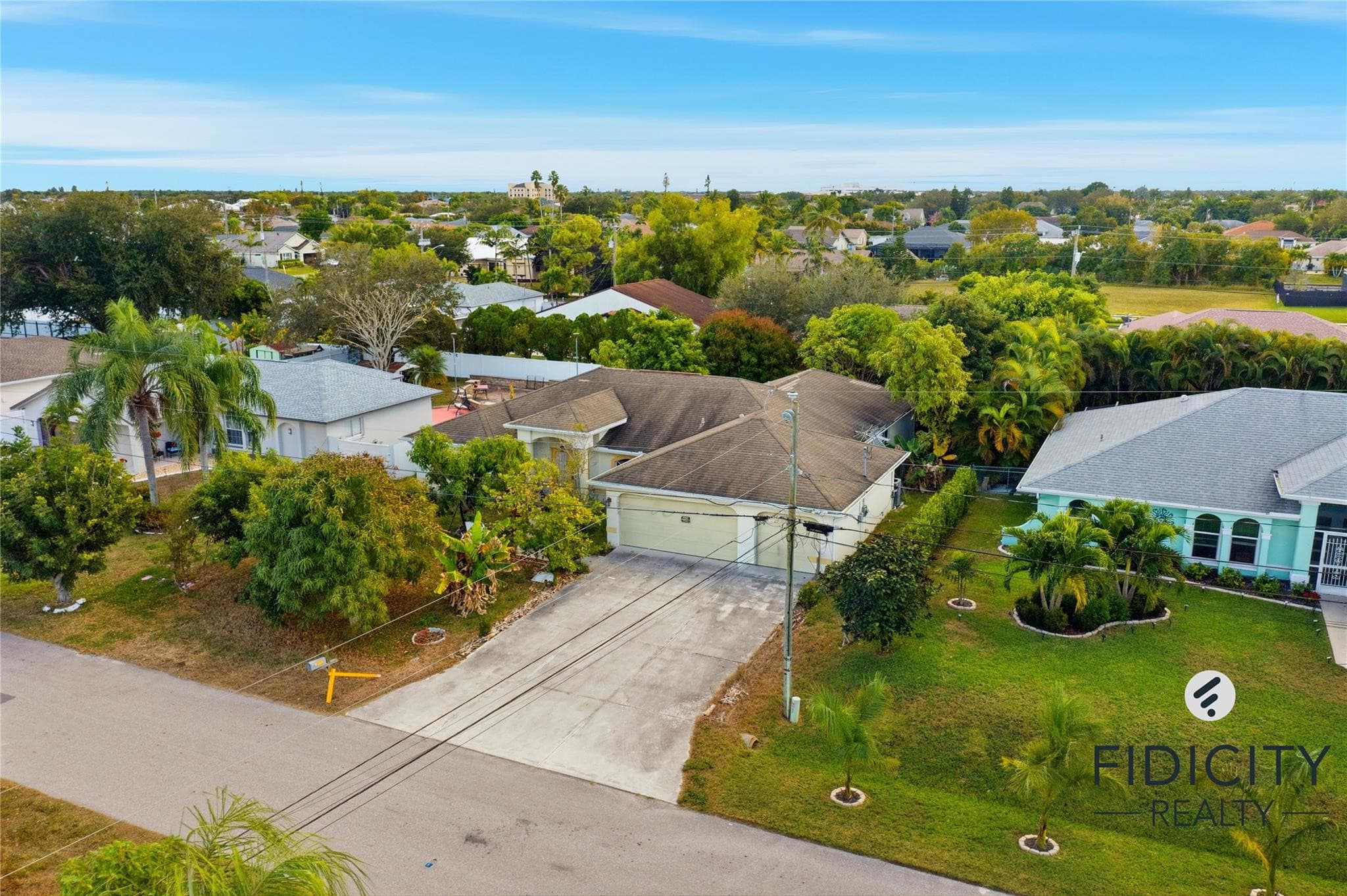 1322 NE Van Loon Lane, Cape Coral, FL 33909 — photo 2 of 65