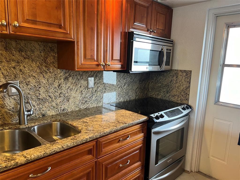 1301 E Hillsboro Boulevard 205, Deerfield Beach, FL 33441 — photo 5 of 37