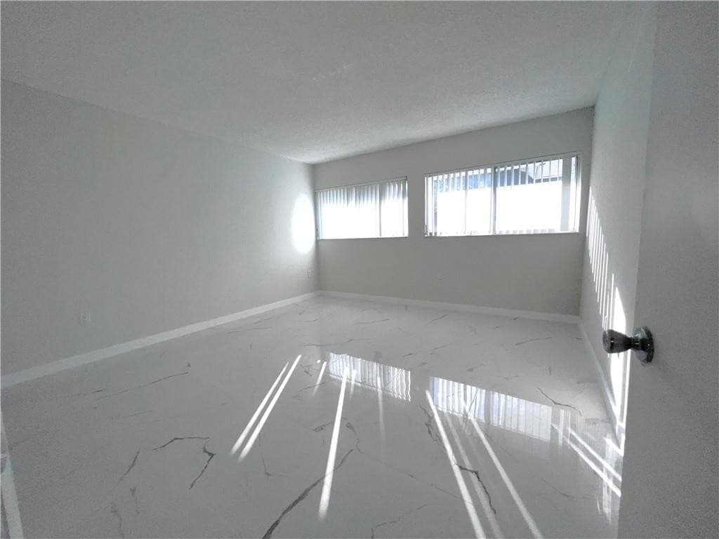 701 N Pine Island Road 303, Plantation, FL 33324 — photo 12 of 20