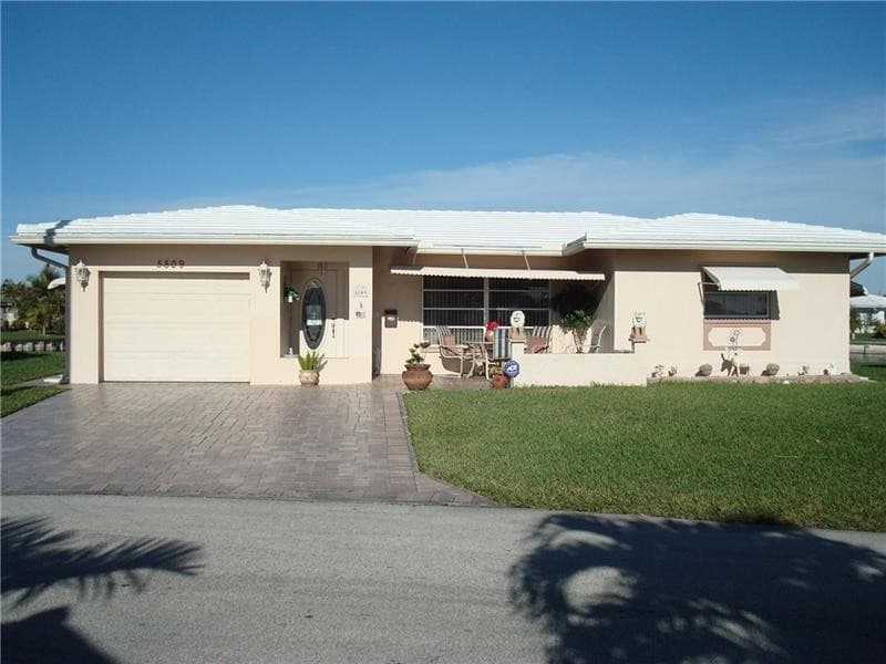 5809 NW 85th Avenue, Tamarac, FL 33321 — photo 1 of 19
