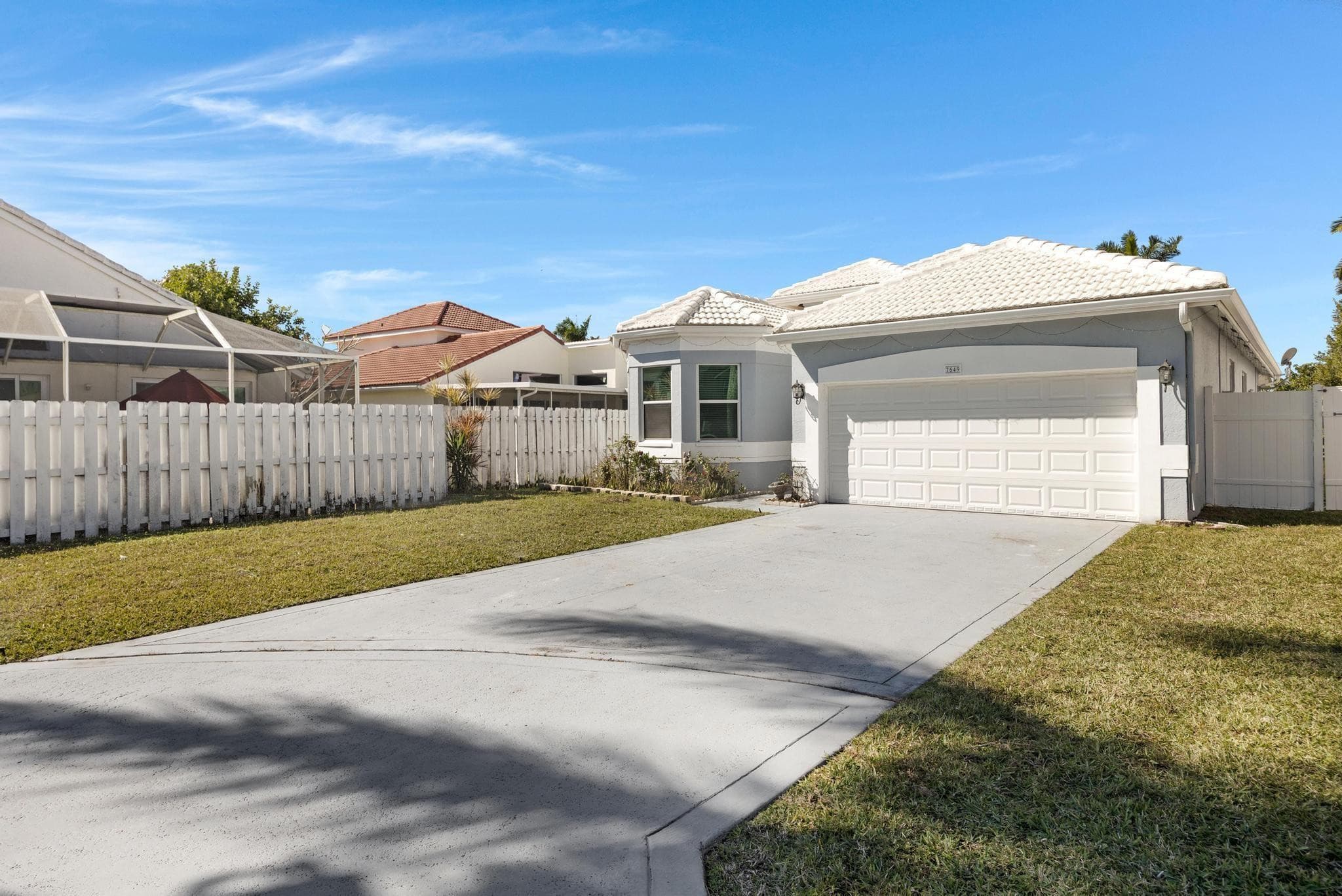 7549 Thornlee Drive, Lake Worth, FL 33467 — photo 1 of 50