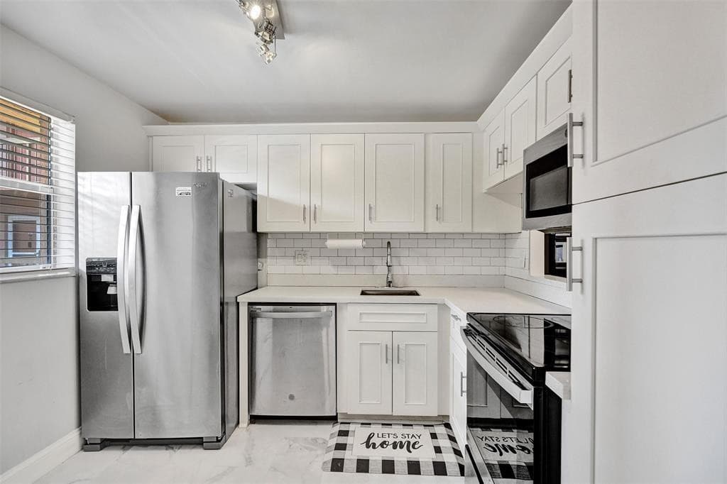 3050 Holiday Springs Boulevard 210, Margate, FL 33063 — photo 2 of 23