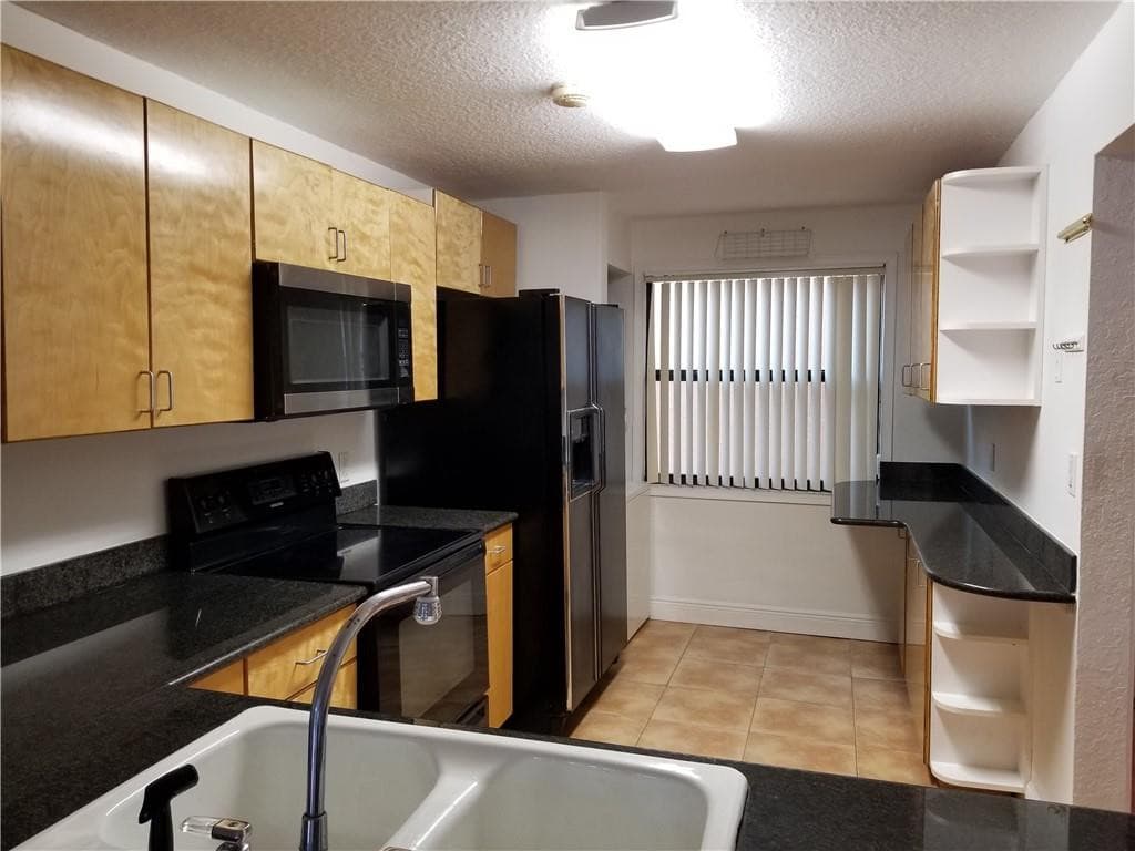 430 Commodore Drive 210, Plantation, FL 33325 — photo 1 of 50