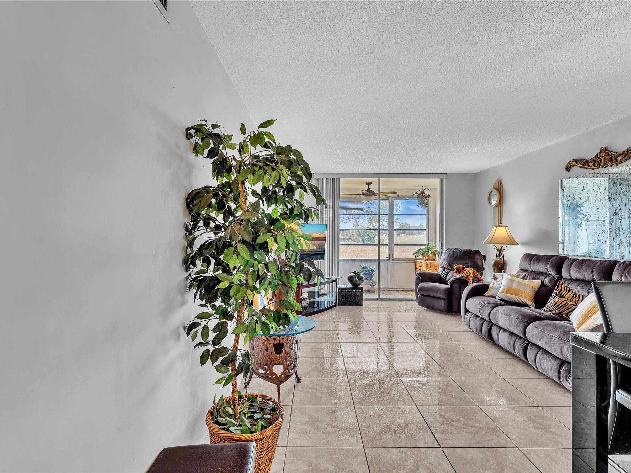 9041 Sunrise Lakes Boulevard 113, Sunrise, FL 33322 — photo 1 of 50