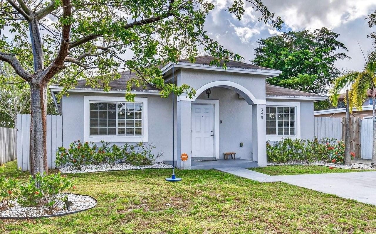 348 NW 40th Court, Oakland Park, FL 33309 — photo 1 of 31
