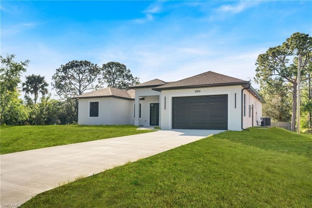 2909 9th Street, Lehigh Acres, FL 33971 — photo 1 of 20