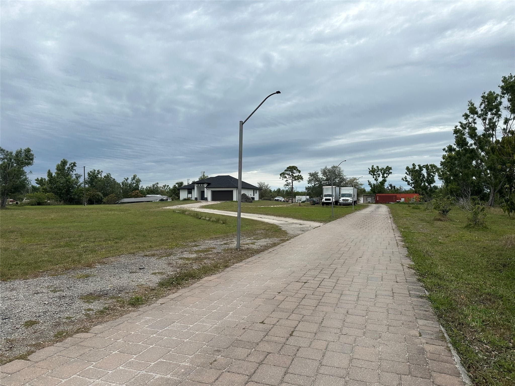 3401 Sand Road, Cape Coral, FL 33993 — photo 3 of 39