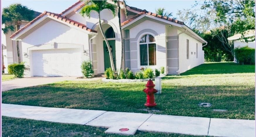9139 Citrus Isle Lane, Lake Worth, FL 33467 — photo 1 of 17