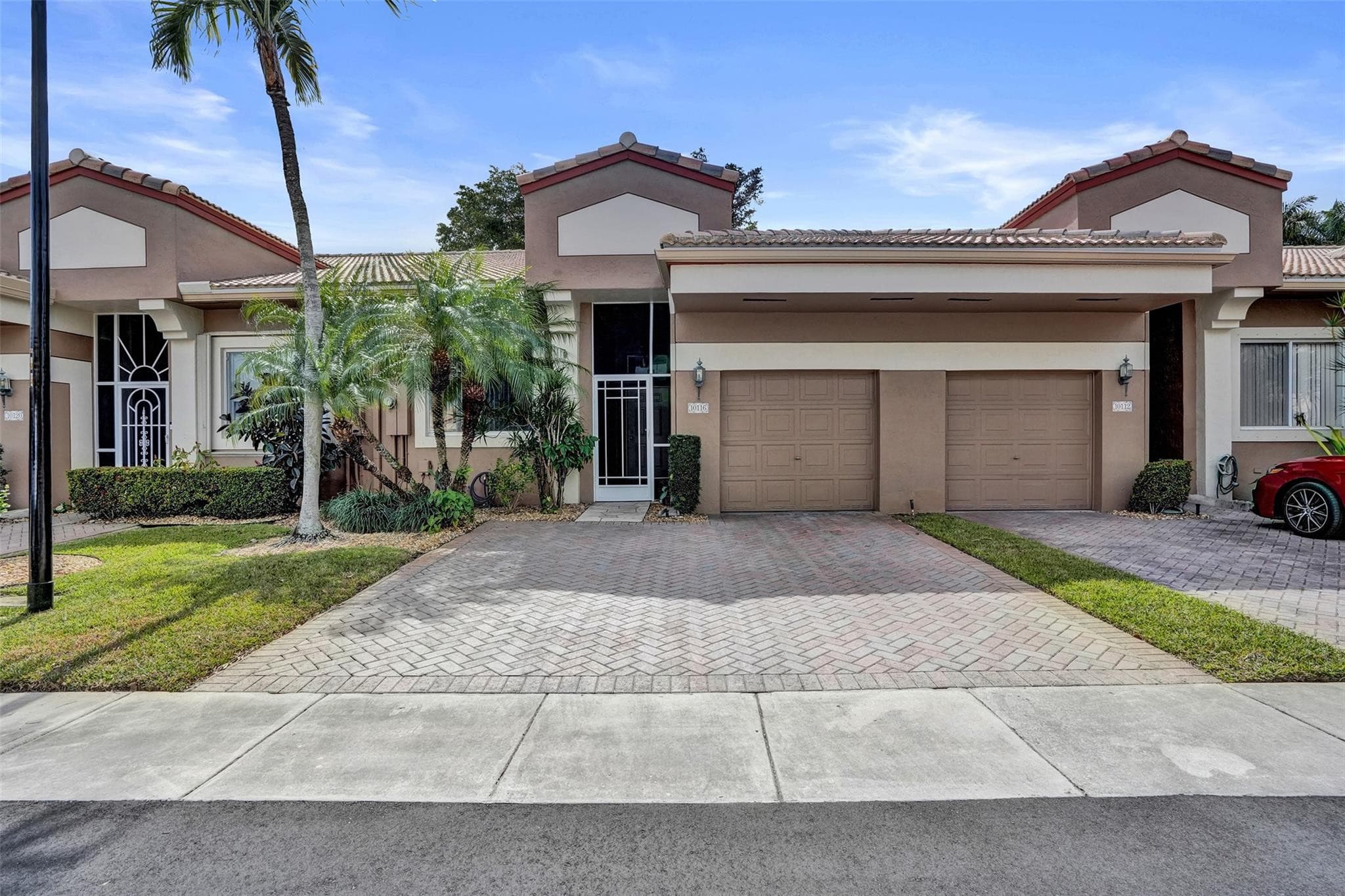 10116 Lombardy Drive 10116, Tamarac, FL 33321 — photo 1 of 48