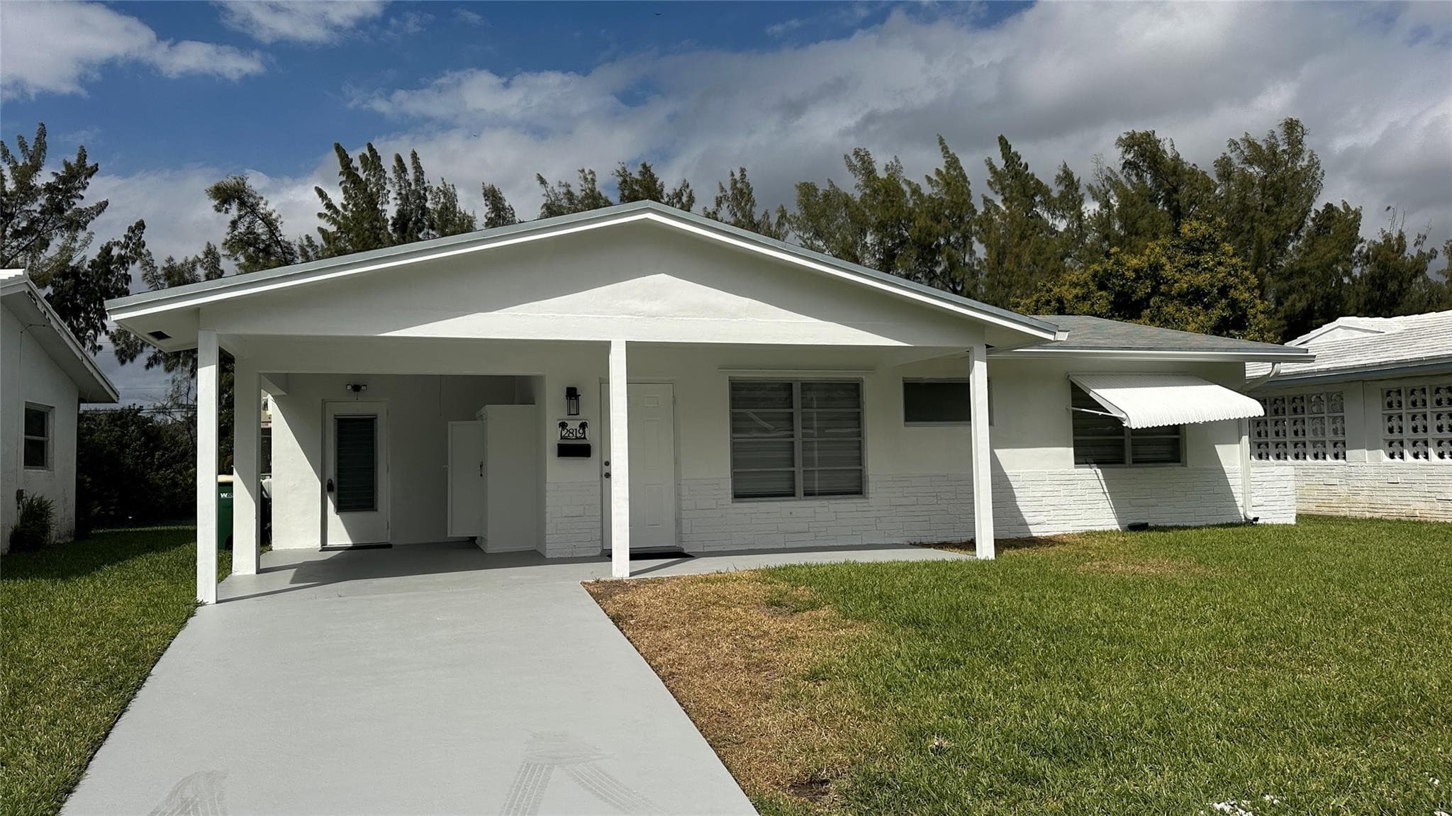2819 NW 52nd Court, Tamarac, FL 33309 — photo 1 of 37