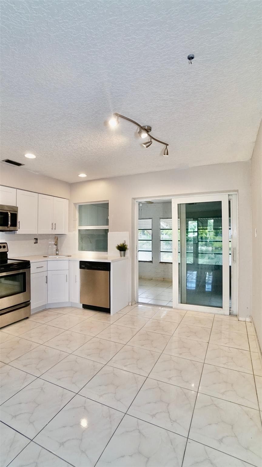 5908 NW 81st Avenue, Tamarac, FL 33321 — photo 9 of 32