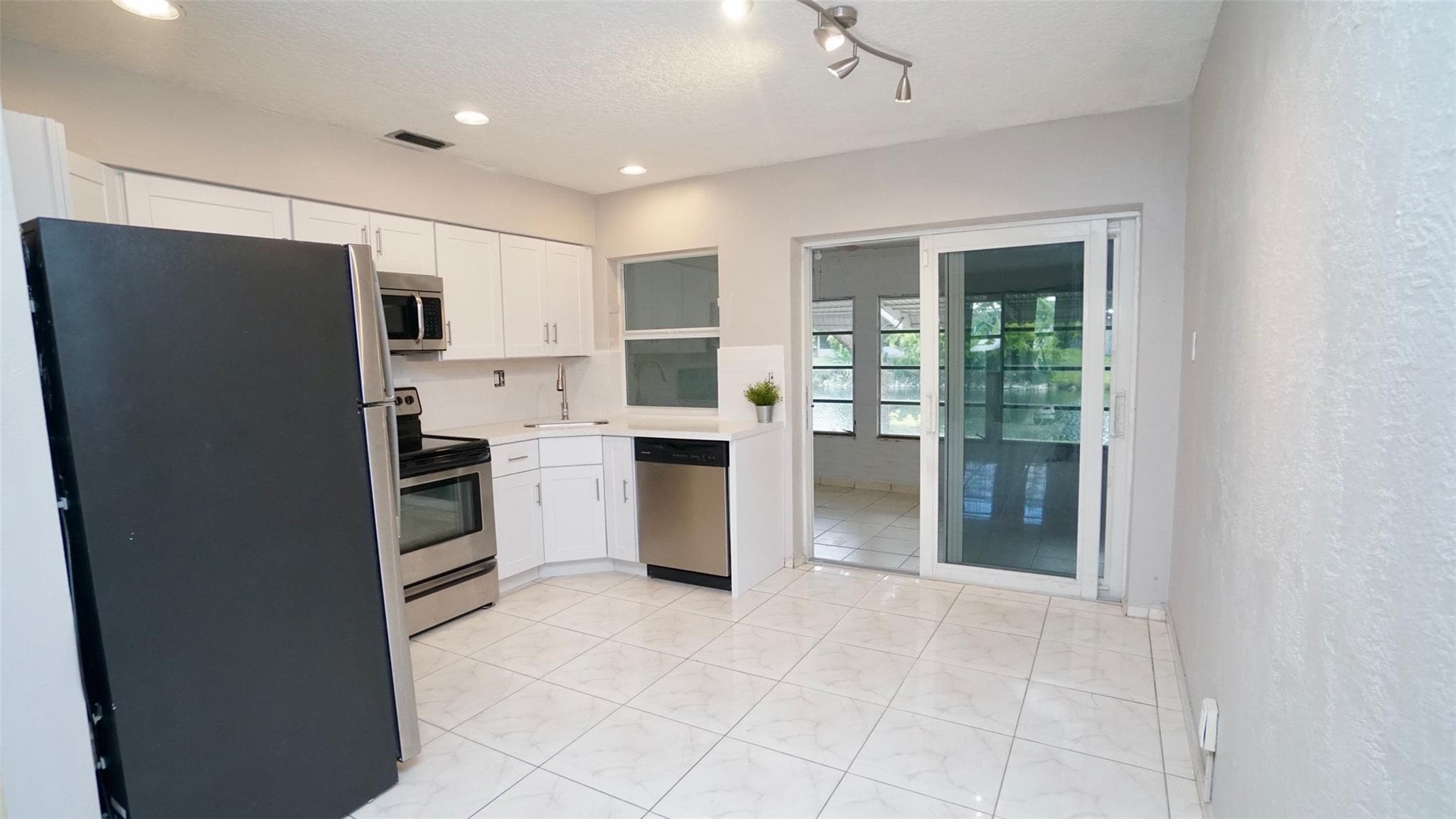 5908 NW 81st Avenue, Tamarac, FL 33321 — photo 13 of 32