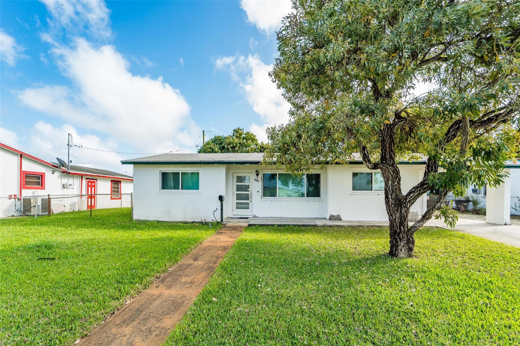 241 W 20th Street, Riviera Beach, FL 33404 — photo 1 of 43