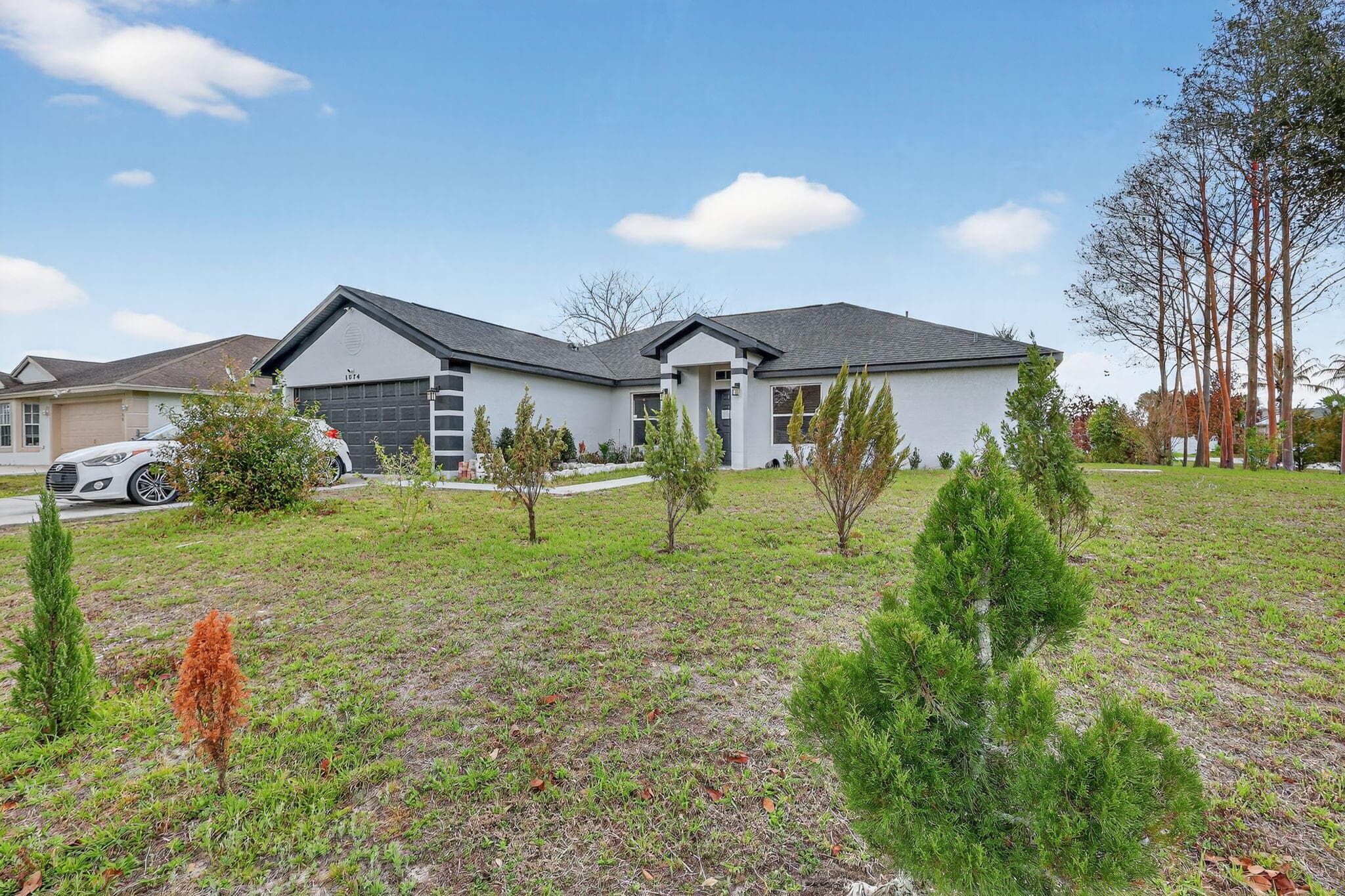 1574 SW Fresno Road, Port St. Lucie, FL 34953 — photo 2 of 56