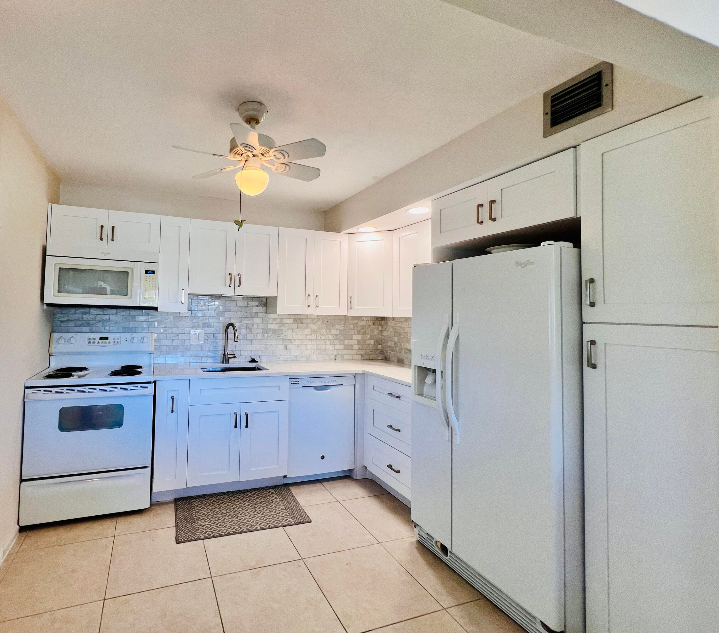 314 Wellington D, West Palm Beach, FL 33417 — photo 1 of 19