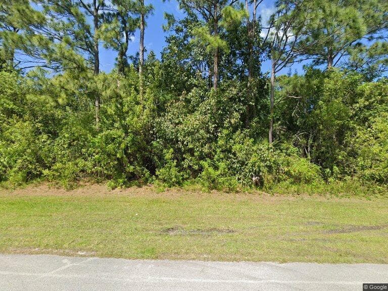 1073 SW Calmar Avenue, Port St. Lucie, FL 34953 — photo 1 of 1