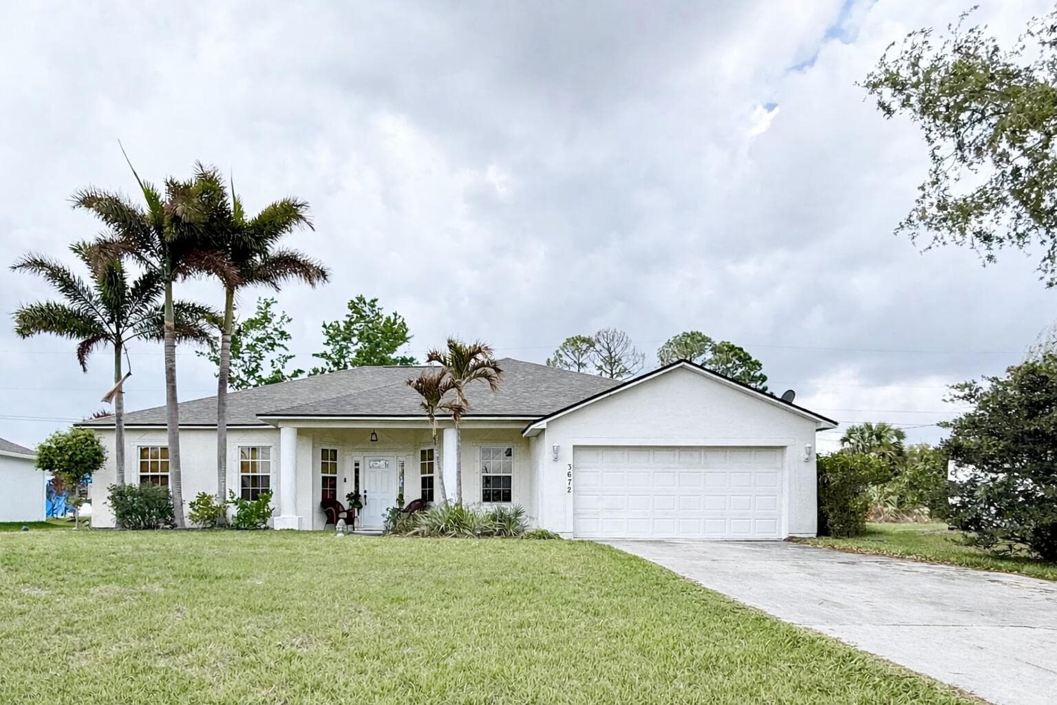 3672 SW Vollmer Street, Port St. Lucie, FL 34953 — photo 2 of 33