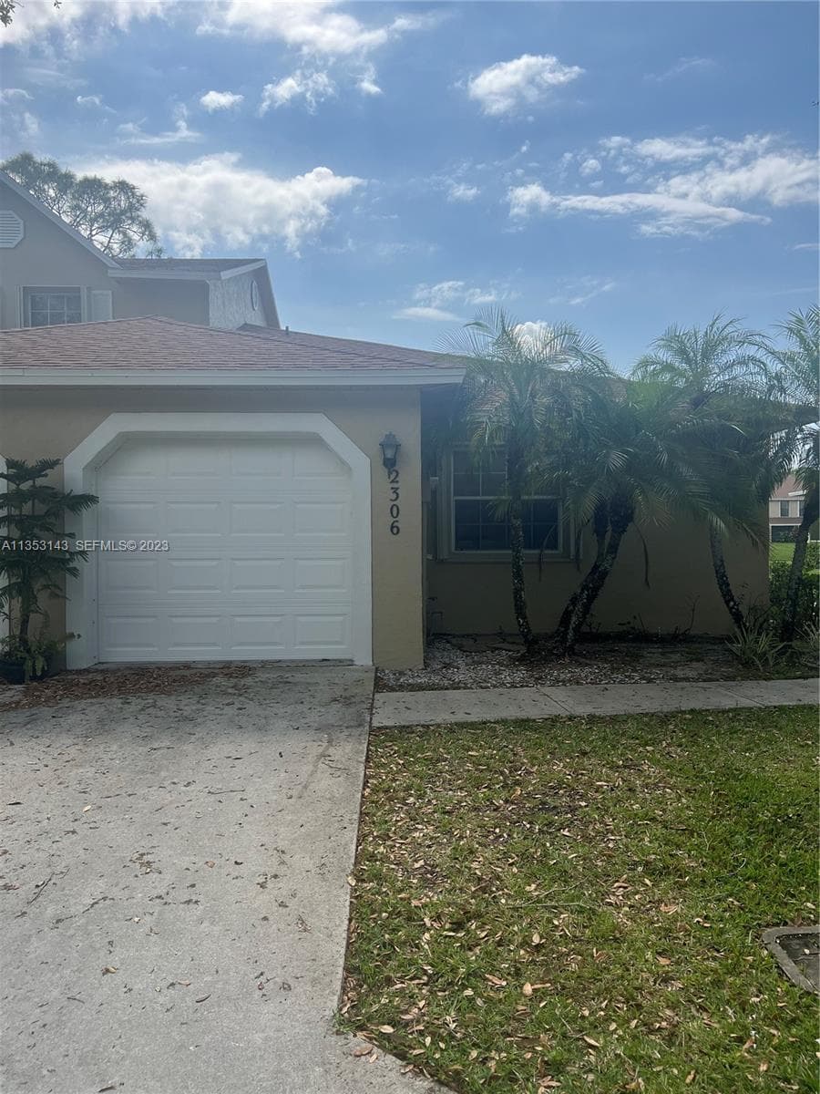 2306 Maplewood Drive, Greenacres, FL 33415 — photo 2 of 13