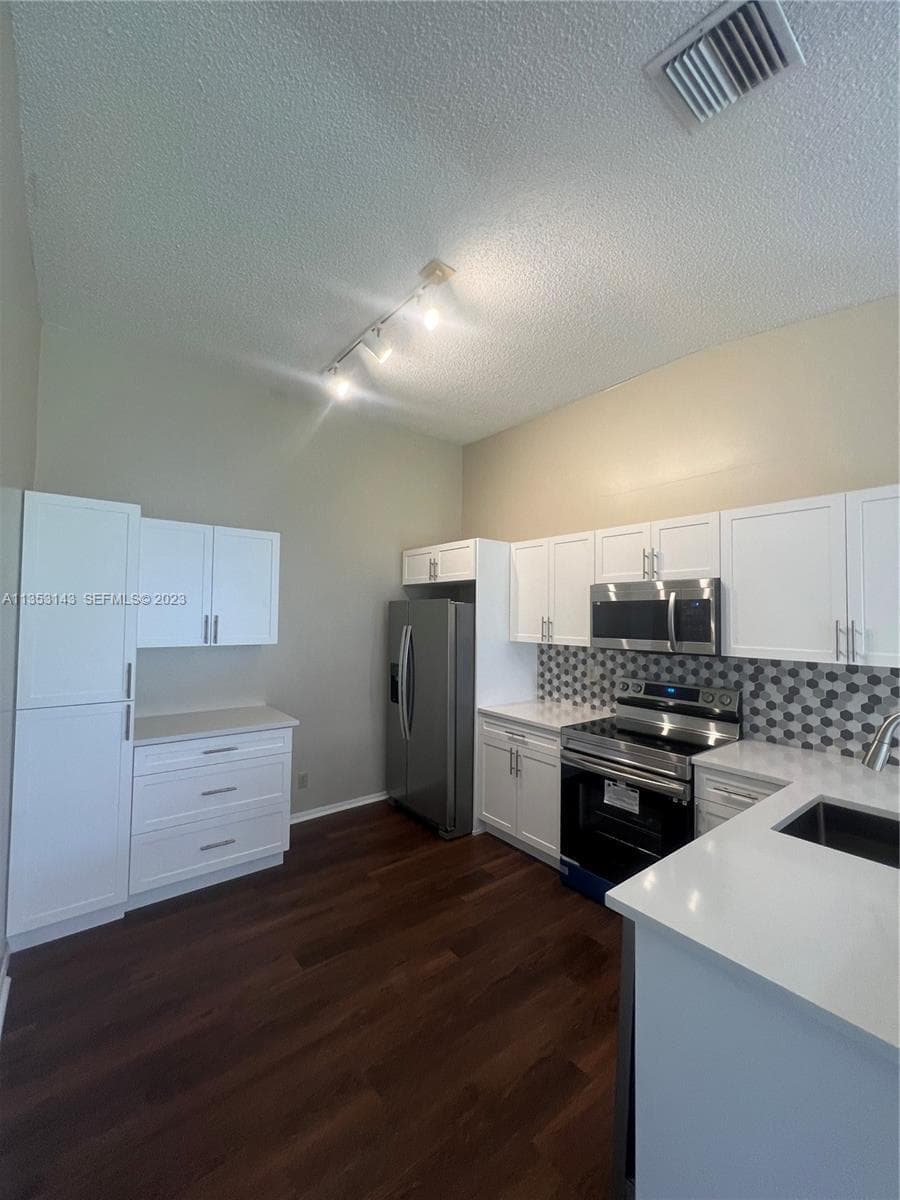 2306 Maplewood Drive, Greenacres, FL 33415 — photo 1 of 13