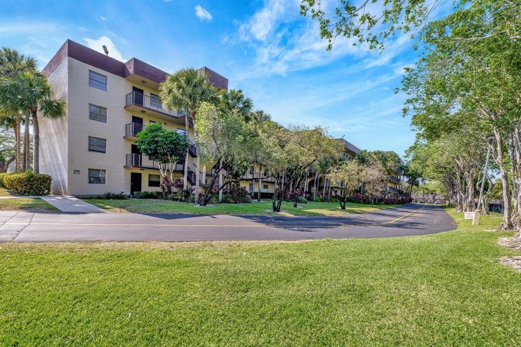 3301 NW 47th Terrace Unit 403, Lauderdale Lakes, FL 33319 — photo 1 of 39