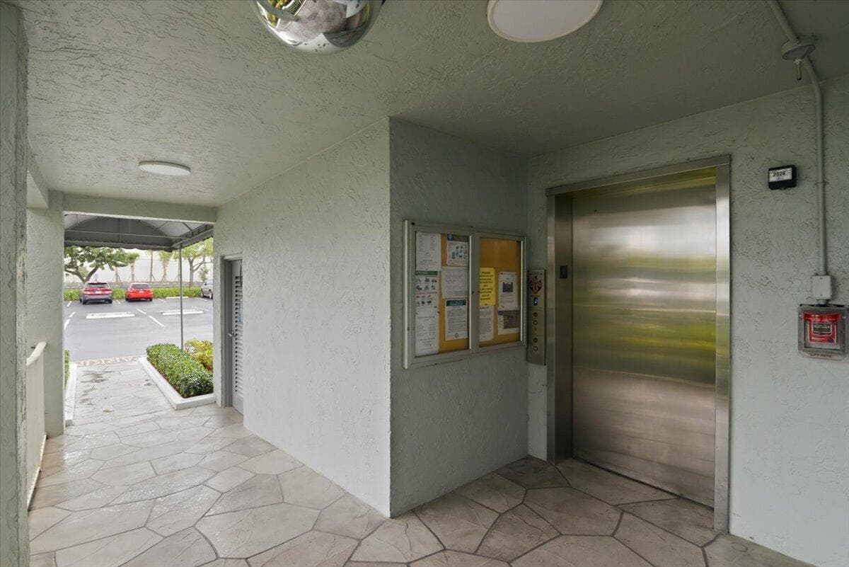 2220 N Cypress Bend Drive 410, Pompano Beach, FL 33069 — photo 2 of 27