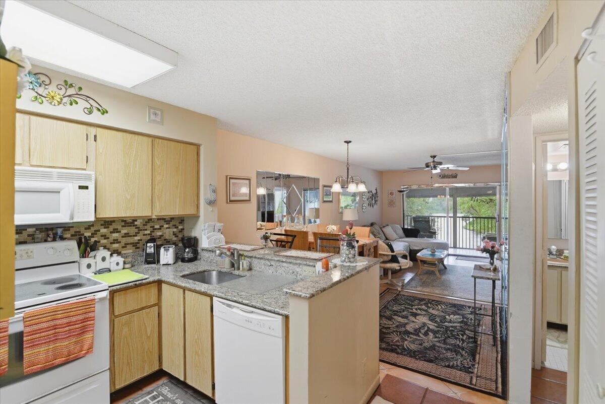 2220 N Cypress Bend Drive 410, Pompano Beach, FL 33069 — photo 6 of 27