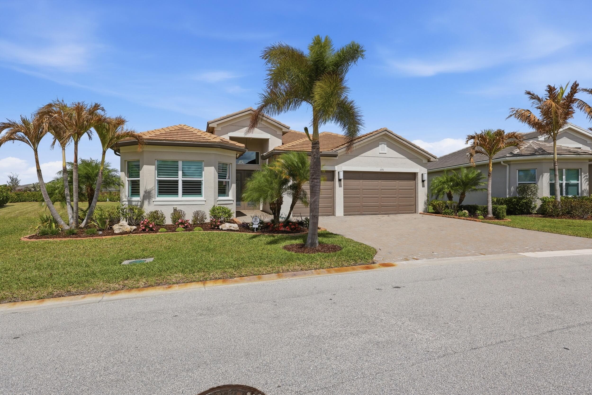 11711 SW Coronado Springs Drive, Port St. Lucie, FL 34987 — photo 1 of 64