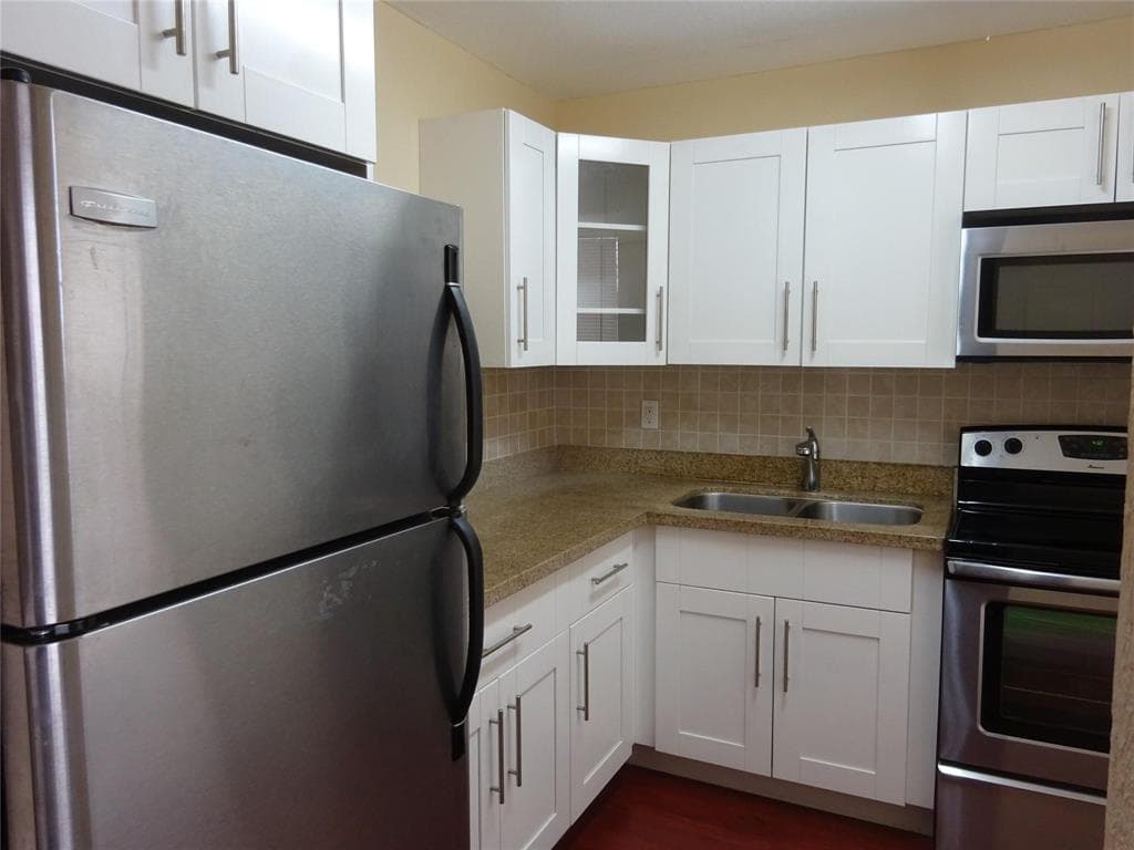 6050 NW 64th Avenue 307, Tamarac, FL 33319 — photo 2 of 17