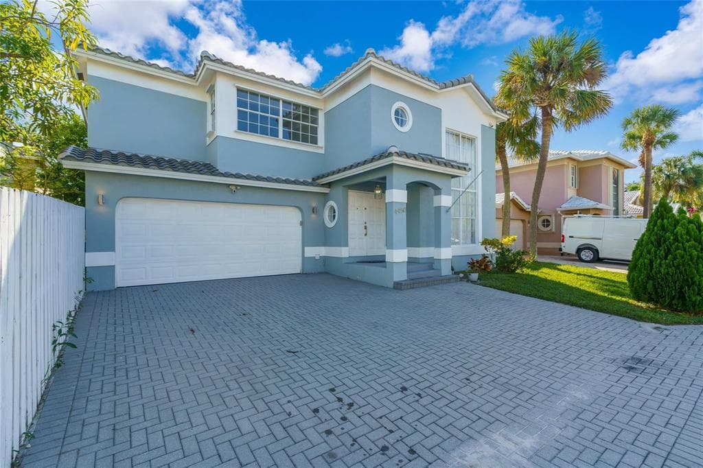 4450 NW 55th Drive, Coconut Creek, FL 33073 — photo 2 of 52