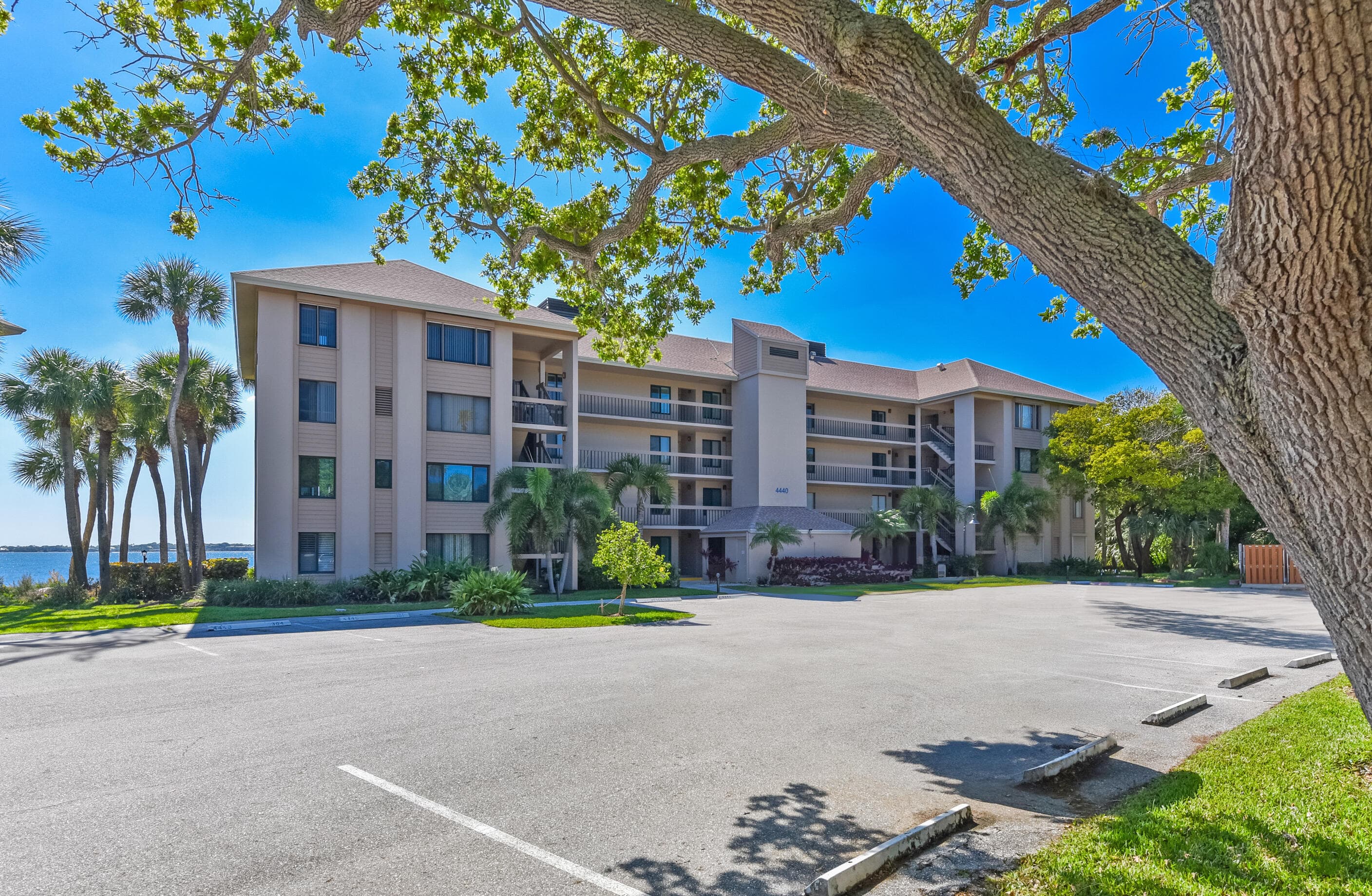 4440 NE Sandpebble Trace 104, Stuart, FL 34996 — photo 1 of 51