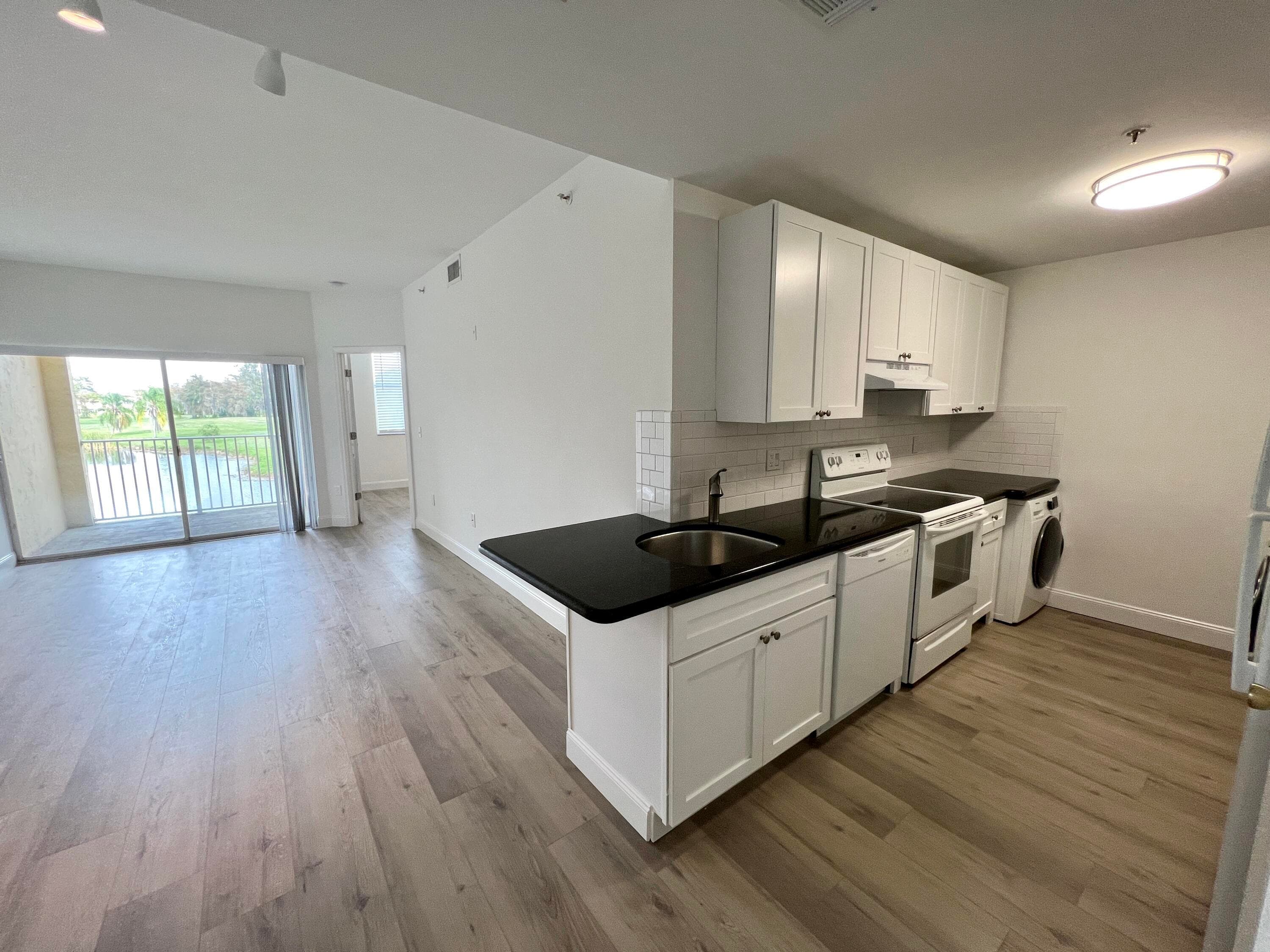 2040 Greenview Shores Boulevard 214, Wellington, FL 33414 — photo