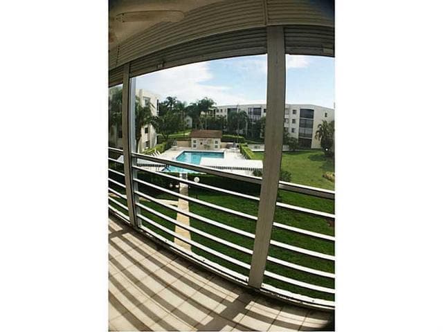 3186 Via Poinciana 311, Greenacres, FL 33467 — photo 1 of 9