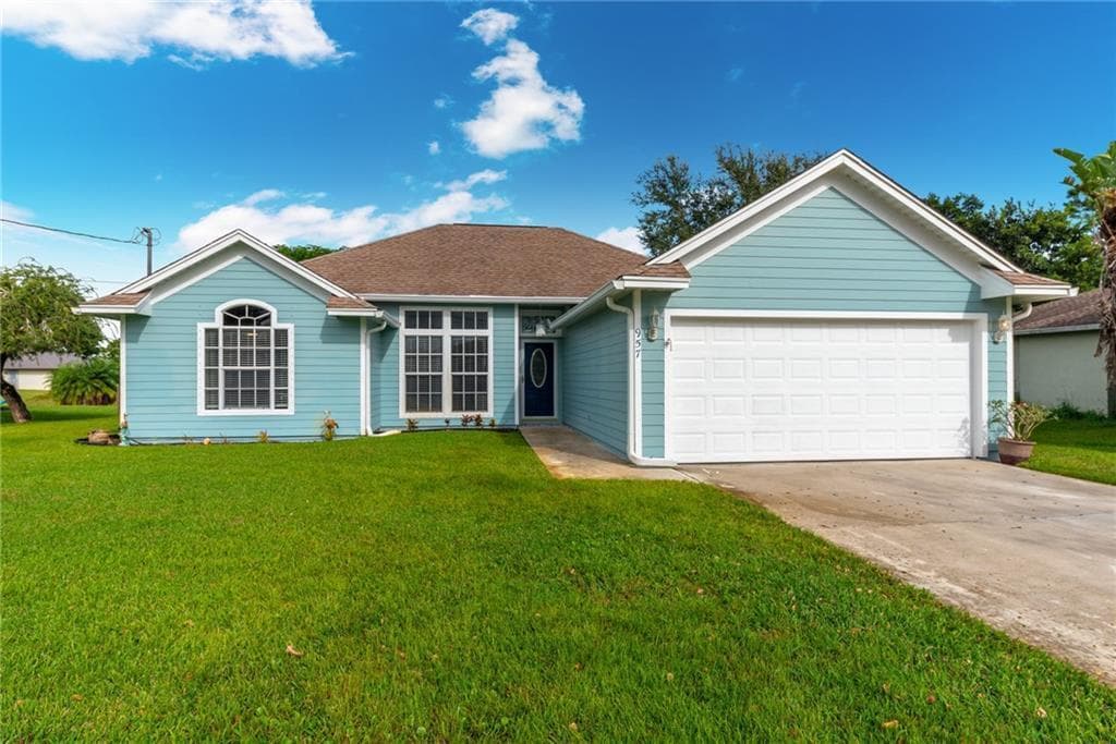 957 SW Jacqueline Avenue, Port St. Lucie, FL 34953 — photo 1 of 49